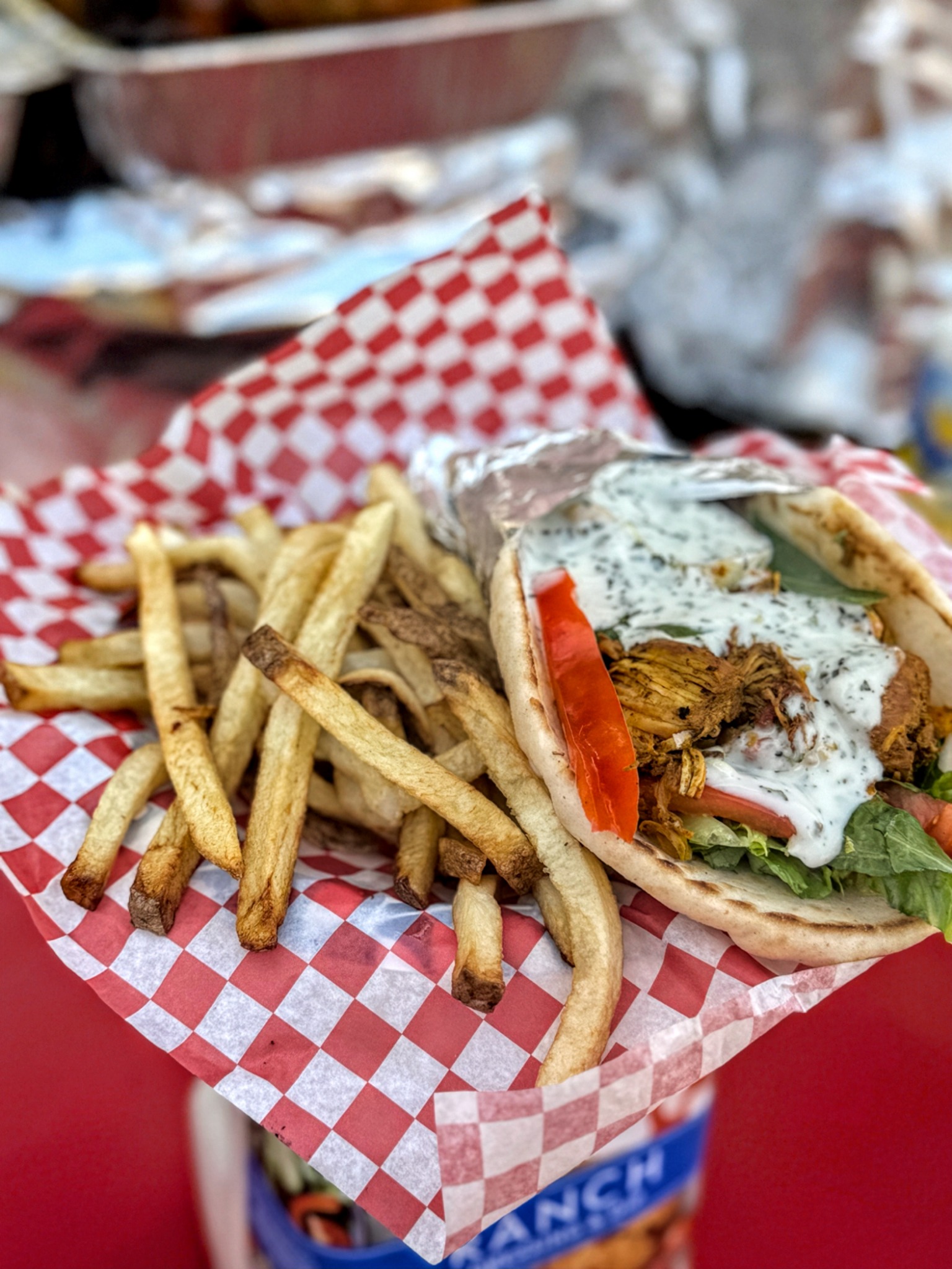 Chicken gyro served with fries