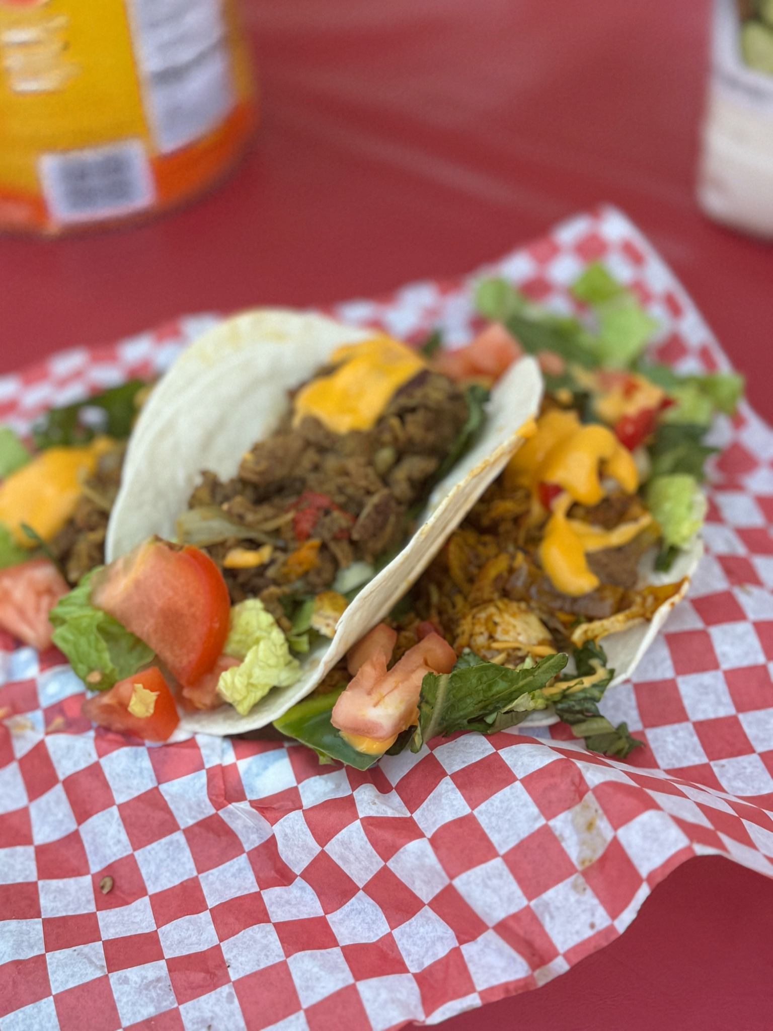 Supreme tacos with lettuce and tomato